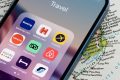 Photo popular travel booking apps on a cellphone screen